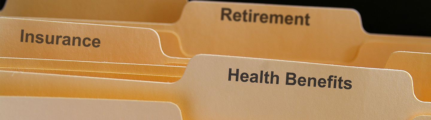File folders with employee befits, health, retirement, insurance. File folders with employee befits, health, retirement, insurance.