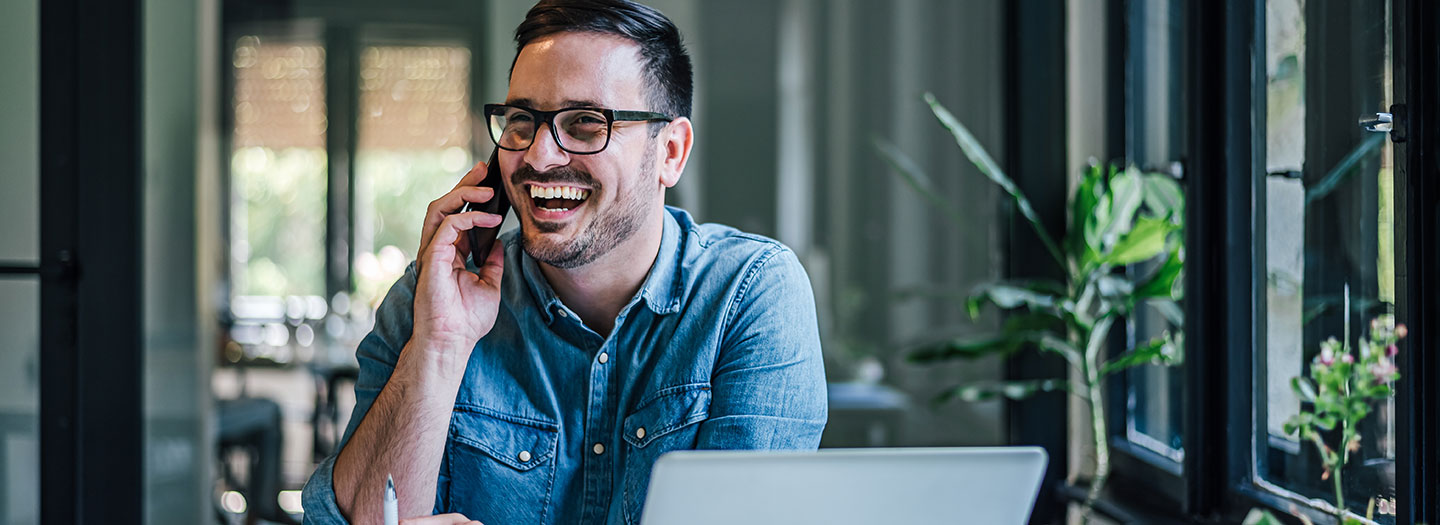 Relaxed business owner making a phone call
